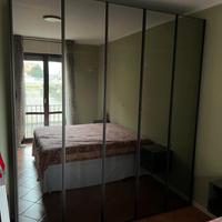 Armadio 5 ante legno e vetro fumè 
