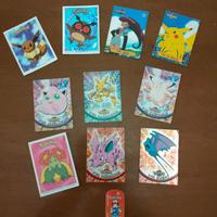 Set di 11 carte Pokémon.

