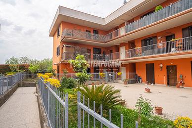 TRILOCALE AL PIANO TERRA CON GIARDINO