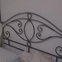 Letto in ferro battuto a baldacchino