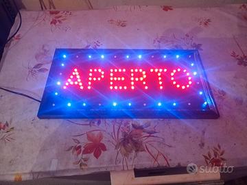 insegna luminosa 