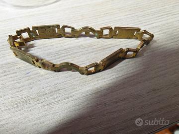 bracciale uomo maglie semirigide colore oro