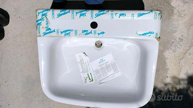 Lavabo bianco modello conca semi incasso