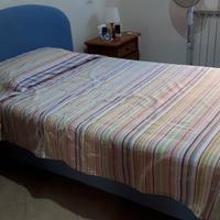 Letto 1 piazza e mezza motorizzato con testiera