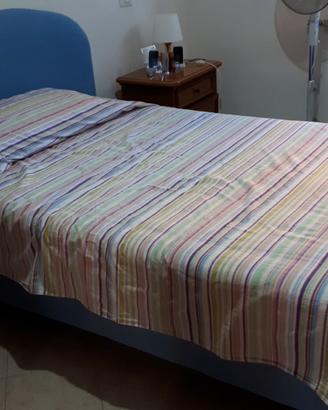 Letto 1 piazza e mezza motorizzato con testiera +