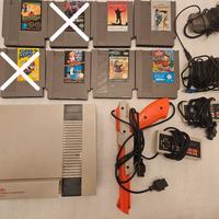 Nintendo Nes anni 90 con cavi, controller e giochi