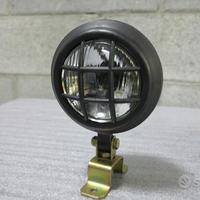 Faro con griglia per moto custom