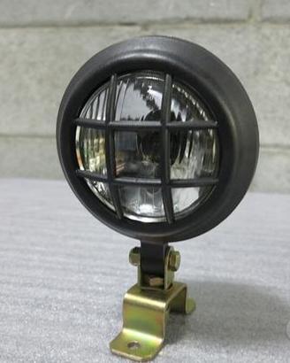 Faro con griglia per moto custom