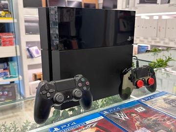 Sony PlayStation 4 + 6 Giochi + 2 Controller