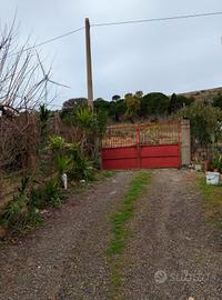 terreno con casa e gebbia