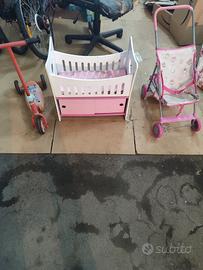 culla  bambole , monopattino e passeggino 