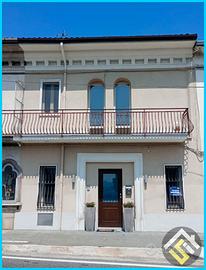 Splendida bifamiliare con giardino