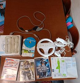 Vando gadget per Wii più 5 giochi