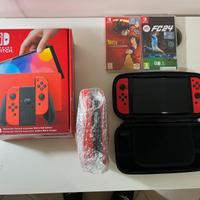 Bundle Nintendo Switch OLED rossa, con 2 giochi