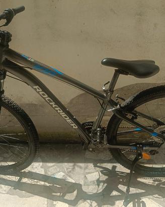 bicicletta mountain bike Rockrider ST 100 grigia