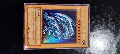 drago bianco occhi blu Yu-Gi-Oh 