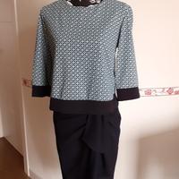 Blusa con gonna nera