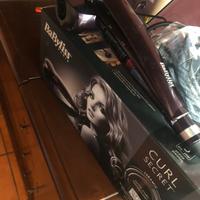 Piastra ceramica professionale arricciacapelli.