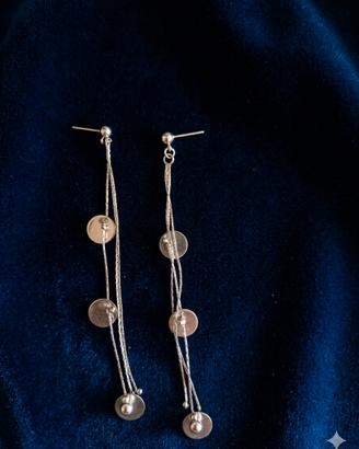 Orecchini lunghi pendenti color argento con dische