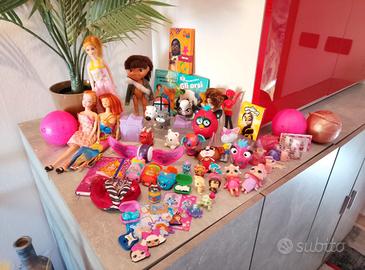 Lotto giocattoli bambina barbie furby ecc.
