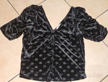 MAGLIA DONNA NERA A POIS IN POLIESTERE
MISURA L