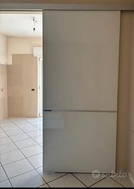 Porta in vetro e acciaio