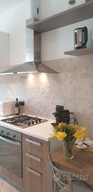 Como trilocale arredato