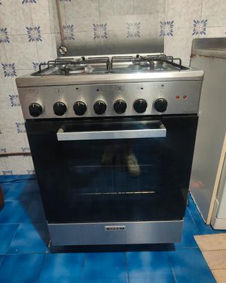 cucina GLEM inox 4 fuochi  con forno ventilato 