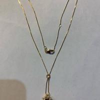 Catenina oro con ciondolo in rubino e brillanti