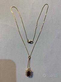 Catenina oro con ciondolo in rubino e brillanti