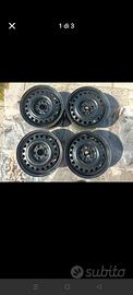 4 cerchi in ferro r 15  a 5 fori ford