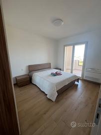 Stanza matrimoniale con bagno e veranda privata