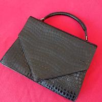 Borsetta da donna in pelle nera lavorata