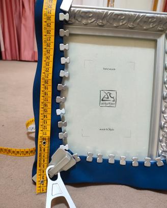 Cornice ANTARTIDEE in resina e metallo