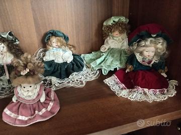 10 bamboline in porcellana 