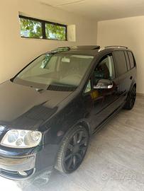 Auto touran