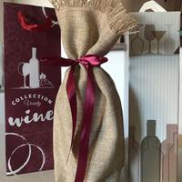 4 scatole, 4 buste, 1 sacchetto porta bottiglie