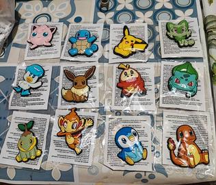  POKÉMON  Lotto 12 Calamite nuove sped gratis sigi
