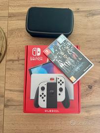 Nintendo Switch OLED +memory card+custodia+gioco