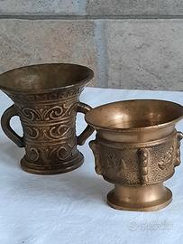 Piccoli mortai in bronzo