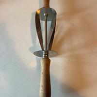 Taglia croissant in inox 25x7,5 cm