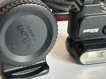 Nikon 1 V1 + doppio zoom + adattatore FT-1 + flash