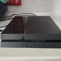 playstation 4 con giochi e joystick 