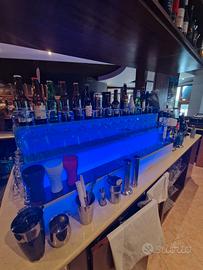 alzatina illuminata back bar esposizione bottiglie
