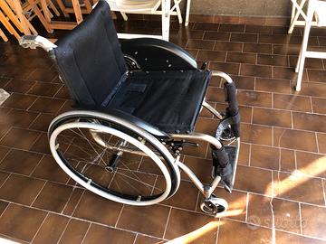 Carrozzina sedia a rotelle OffCarr Quasar titanio