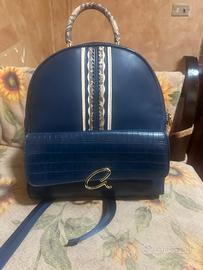 Zaino elegante con dettagli oro