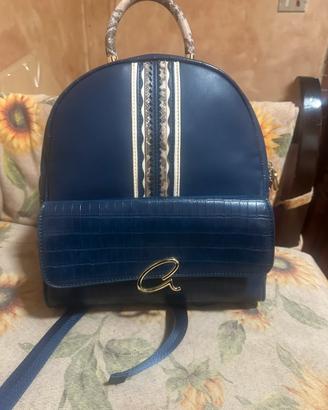 Zaino elegante con dettagli oro