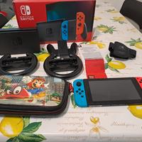 nintendo switch con custodia, accessori e gioco