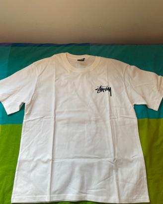 Maglietta stüssy bianca con dadi