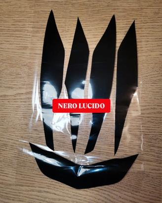 Pellicola pretagliata oscuramento faretto e frecce